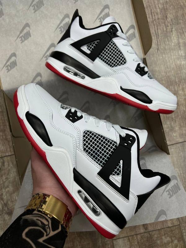 Red black and white best sale jordans 4