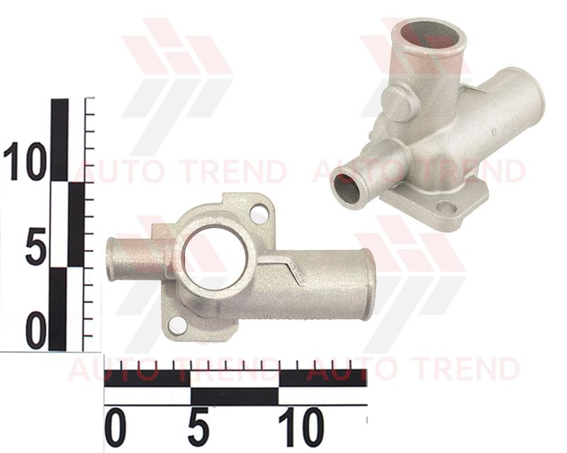 Патрубок головки блока мтз