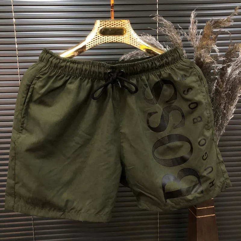 Мужские хаки пляжные шорты Hugo Boss зелёные плавательные купа...